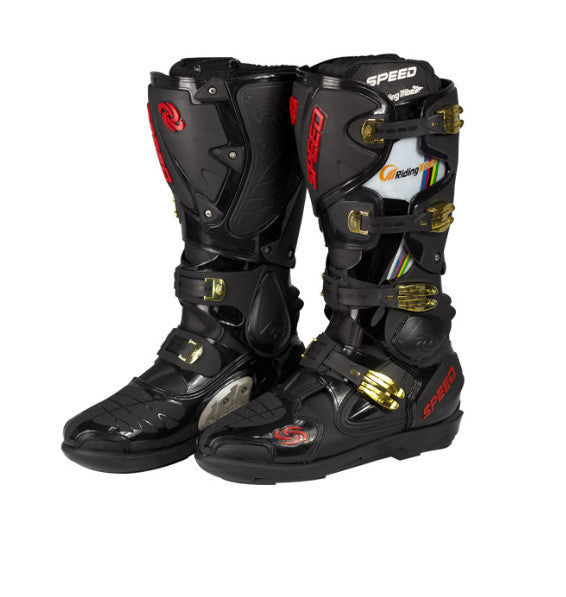 Black motocross boots with gold and red accents on a white background