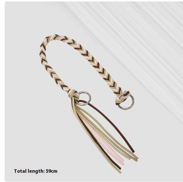 Braided keychain with tassels on a white background