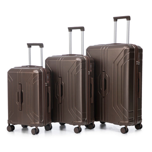 Set of three brown suitcases of different sizes on a white background