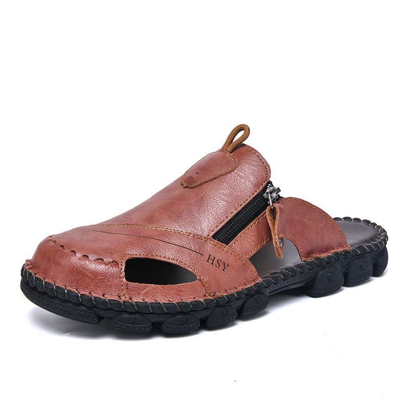 Brown leather sandal with a zipper on a white background