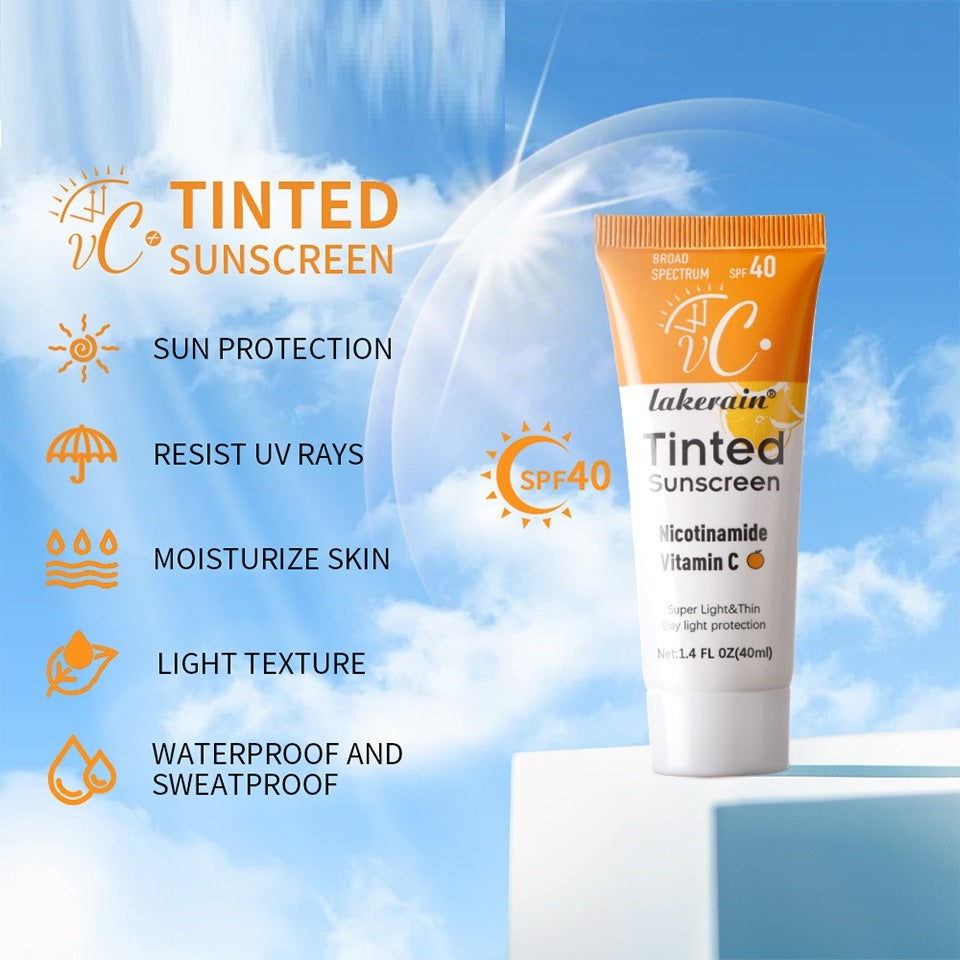 Tinted sunscreen tube with SPF 40 on a blue sky background
