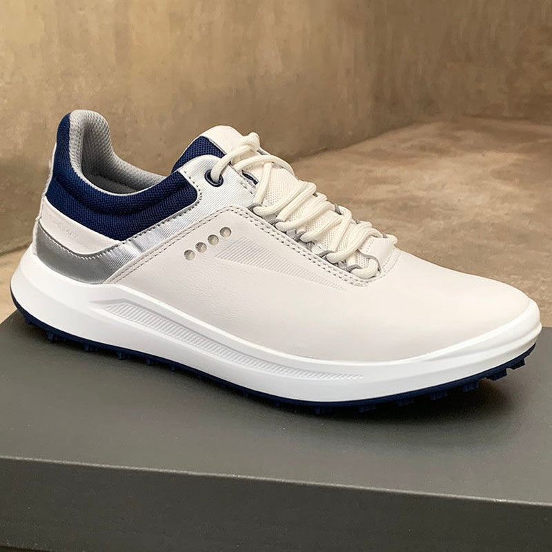 White sneaker with blue accents on a gray surface