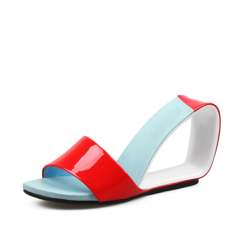 Colorful sandal with red and light blue straps on a white background