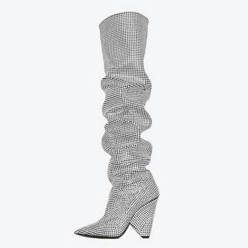 Houndstooth patterned knee-high boot on a white background