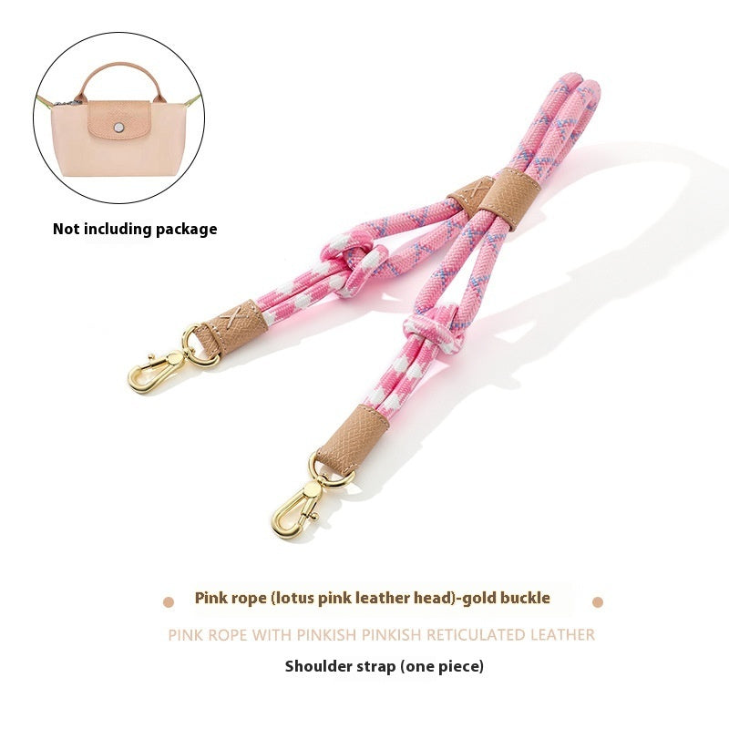 Pink rope shoulder strap with gold buckle on a white background