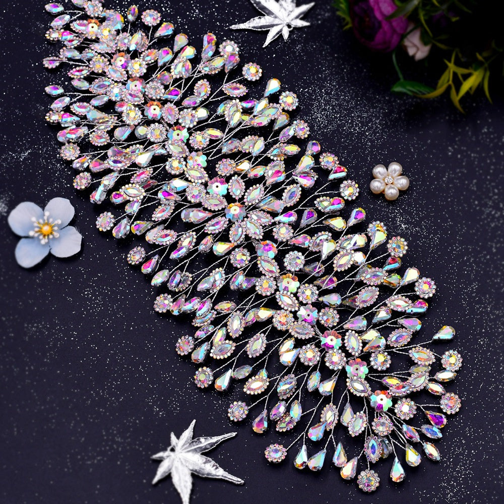 Decorative brooch with gemstones on a dark background